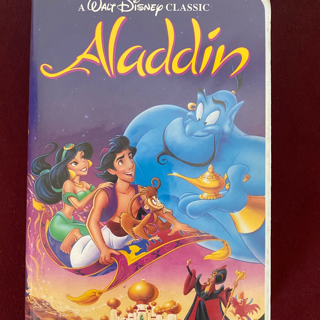 Walt Disney Classics VHS of Aladdin showing the A Walt Disney Classic banner and black diamond logo on the sleeve